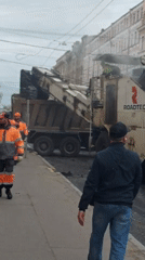 Street maintenance work and daily life documented in Saint Petersburg