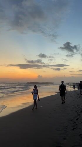 Beach activity captured during sunset in North Kuta