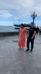 Afternoon waterfront promenade activity captured by witnesses