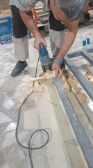 Workshop session mixing carpentry and mechanical installation work