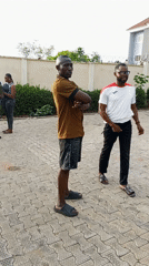 Men gather for casual outdoor meeting in Lokoja, Nigeria