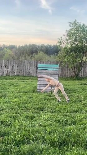 Family backyard activities captured in Rusalevka, Russia afternoon