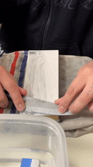 Person sharpens knives near San Bernardo church in Buenos Aires