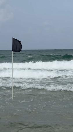 Black flag planted in choppy Mediterranean waters off Herzliya