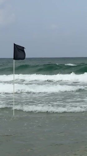 Black flag planted in choppy Mediterranean waters off Herzliya