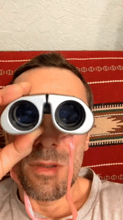 Man filmed indoors holding object in Moscow