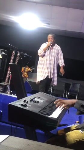Live musical performance featuring vocals, keyboard, drums in Onitsha