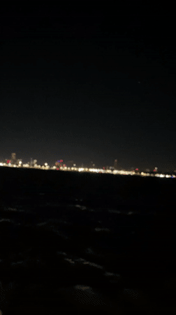 Nighttime footage captures crowd in blue-lit Buenos Aires venue