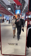 Couple shops for shoes, takes selfies at Petersburg store