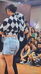 Couple performs dance for audience in Chennai indoor venue