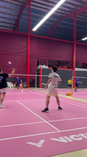 Recreational badminton matches observed at Ko Samui indoor facility