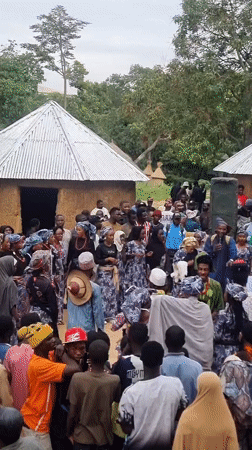 Community gathering with traditional dancing in Jos, Nigeria