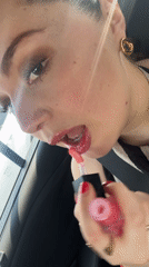 Woman applies makeup during car journey through Mexico City