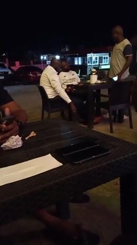 Evening gathering at outdoor venue in Lokoja, Nigeria