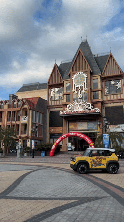 Inside Nha Trang's themed tourist complex, trains, carts, and kitsch sculptures