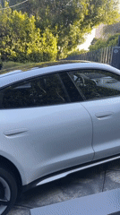 Late-night video production featuring white Porsche filmed in West Hollywood