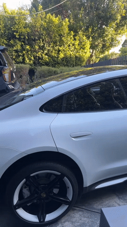 Late-night video production featuring white Porsche filmed in West Hollywood