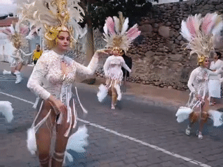 Carnival parade with costumed performers spans Gran Canaria towns