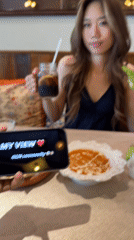 Diner films meal companion at Yuzhong District restaurant