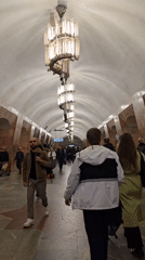 Morning commuters navigate Moscow Metro stations during rush hour