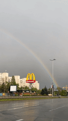 Rainbow appears over wet Sofia streets after early morning rain