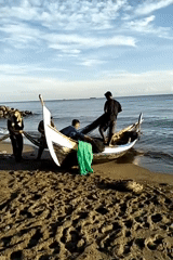 Sunset boat scene recorded at Indonesian beach