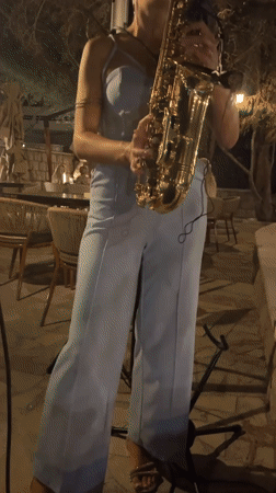 Live saxophone set at an outdoor night venue in Montenegro