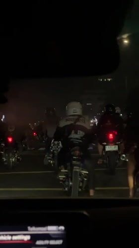 Motorcyclists gather at Jakarta traffic light during evening rush