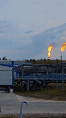 Industrial complex with burning flares documented in Russia