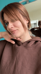 Woman takes bathroom selfies in Antwerp using cartoon-cased iPhone