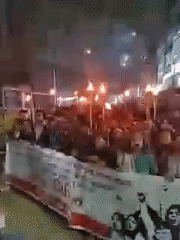 Torch procession protests political party comments in Dhaka