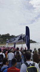 Swimming competition with pink caps draws crowds to Benicàssim beach
