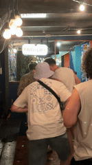 Men dance and socialize at São Paulo bar early Monday