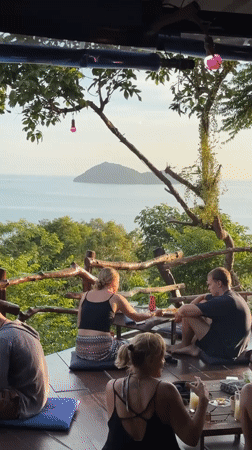Yoga and relaxation on a scenic ocean-view deck in Ko Pha-ngan