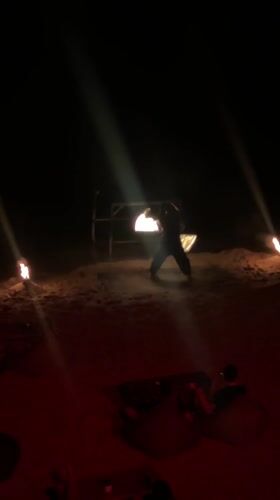 Nighttime beach party with fire dancers in Baan Bo Phut