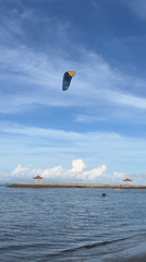 Morning beach recreation captured at Denpasar's Matahari Terbit Beach