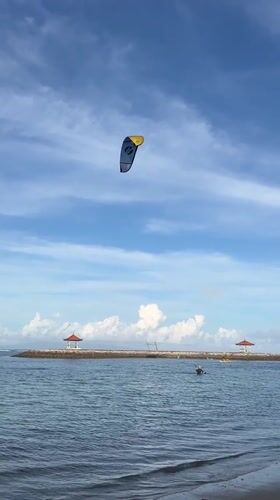 Morning beach recreation captured at Denpasar's Matahari Terbit Beach