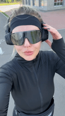 Woman documents selfie session around Krasnoyarsk in athletic wear