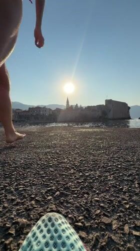 Sunset splash into the Adriatic off Budva's castle coast