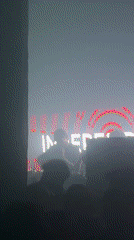 Concert event with DJ, crowds in Buenos Aires club venue