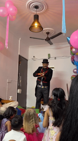Birthday magic show and a pet budgie, Delhi afternoon