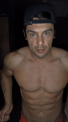 Man poses, flexes muscles in Moscow apartment during evening