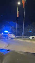 Police conduct traffic stop in Cetinje, Montenegro