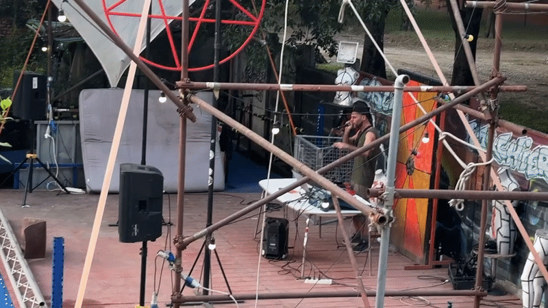 Street performer sings on makeshift stage in Milan