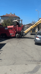 Road repair crew works residential streets in Tsarevo, Bulgaria