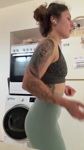 Woman documents home workout session in Kiryat Bialik apartment