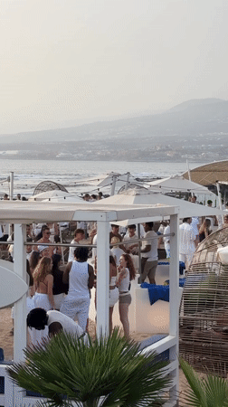 All-white beach party in full swing, Arona, Tenerife