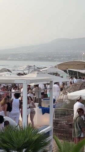All-white beach party in full swing, Arona, Tenerife