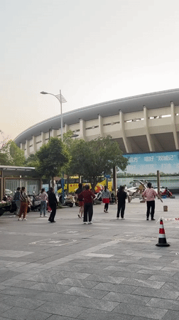 Group exercise and street life observed in Qingyang District