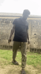 Man with tools observed in residential yard area